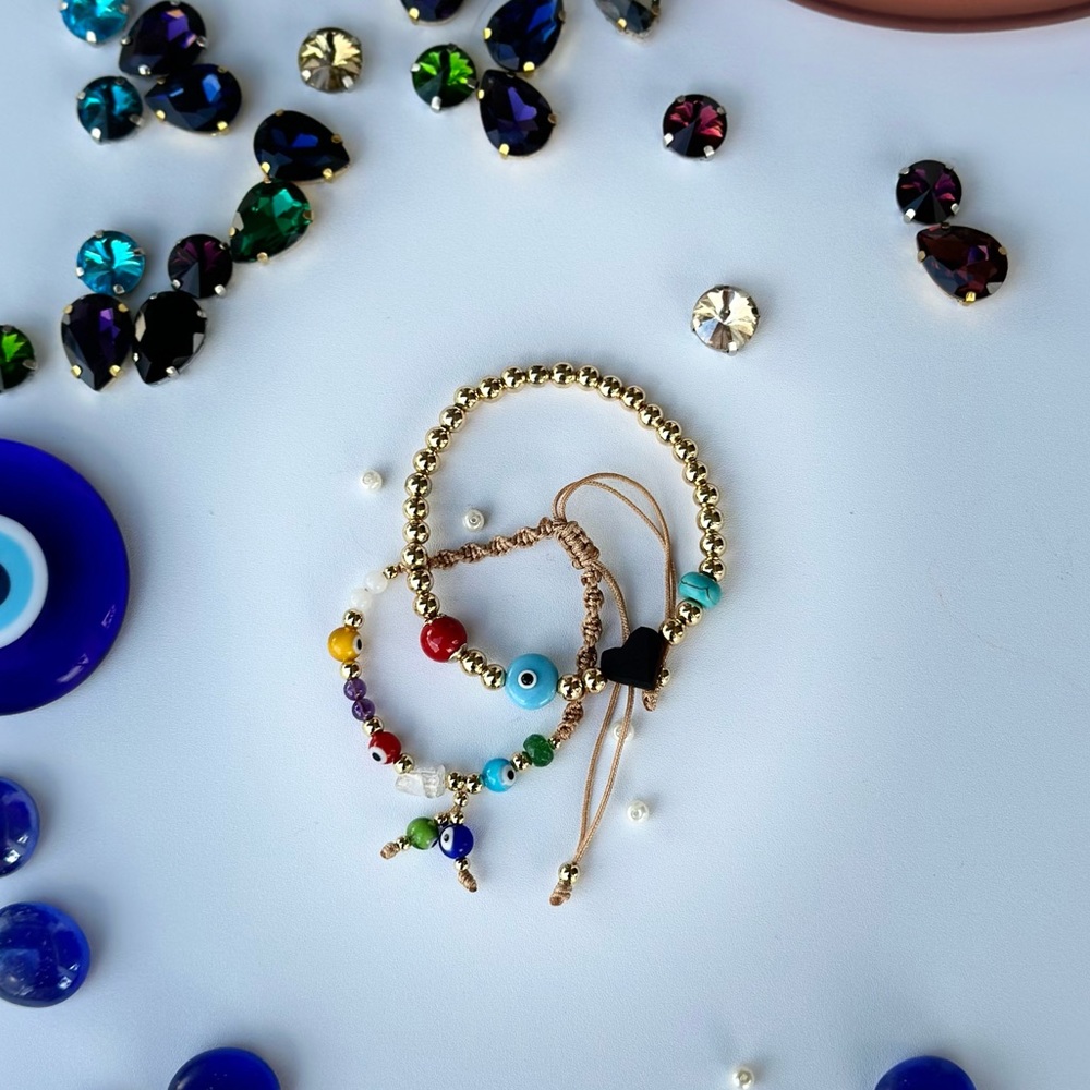 woven bracelet and gold plated bracelet set.